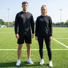 Load image into Gallery viewer, Softshell Drill Training Top being worn by a man and lady on a sports pitch