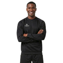 Load image into Gallery viewer, Black Kinetic Sweater being worn by a male model. 
